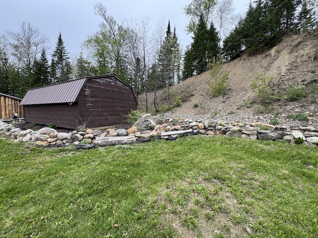 135 W Conroy Lake Rd, Monticello, ME 04760 - view of green lawn featuring an outbuilding