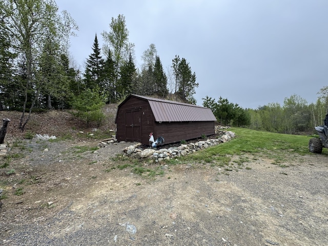 135 W Conroy Lake Rd, Monticello, ME 04760 - view of shed with a view of trees