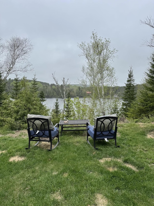 135 W Conroy Lake Rd, Monticello, ME 04760 - view of home's community with a water view, a lawn, and a view of trees