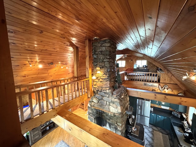135 W Conroy Lake Rd, Monticello, ME 04760 - living room featuring lofted ceiling, wood ceiling, hardwood / wood-style floors, and a ceiling fan
