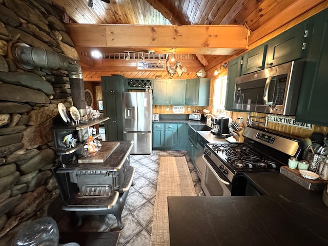 135 W Conroy Lake Rd, Monticello, ME 04760 - kitchen featuring appliances with stainless steel finishes, green cabinets, dark countertops, wooden ceiling, and a sink