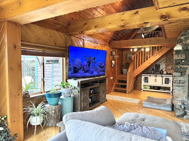 135 W Conroy Lake Rd, Monticello, ME 04760 - living area featuring hardwood / wood-style flooring, wooden walls, wood ceiling, and stairway
