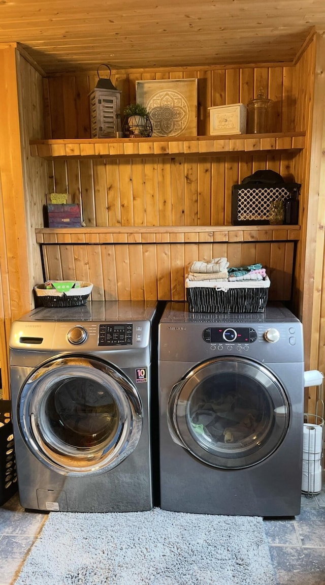 135 W Conroy Lake Rd, Monticello, ME 04760 - laundry area featuring washing machine and dryer, wooden walls, and wooden ceiling