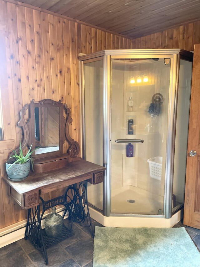 135 W Conroy Lake Rd, Monticello, ME 04760 - bathroom with wooden walls, wood ceiling, a shower stall, and a baseboard radiator