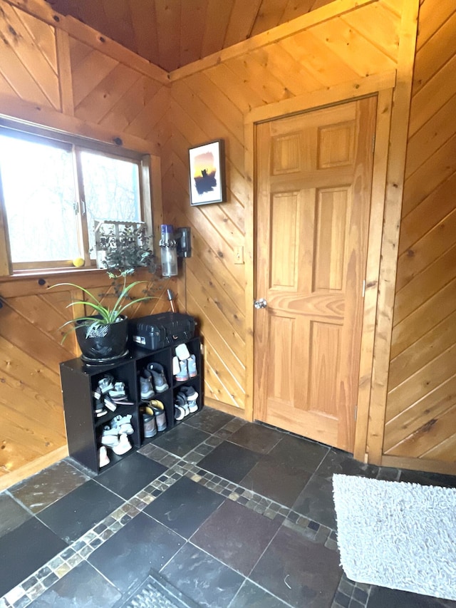 135 W Conroy Lake Rd, Monticello, ME 04760 - foyer entrance with wood walls
