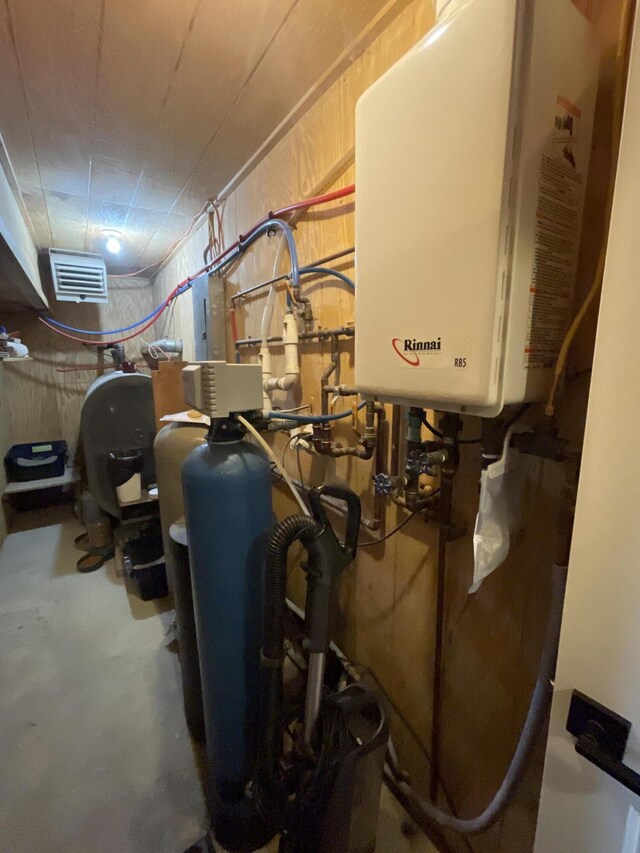 135 W Conroy Lake Rd, Monticello, ME 04760 - utility room with tankless water heater