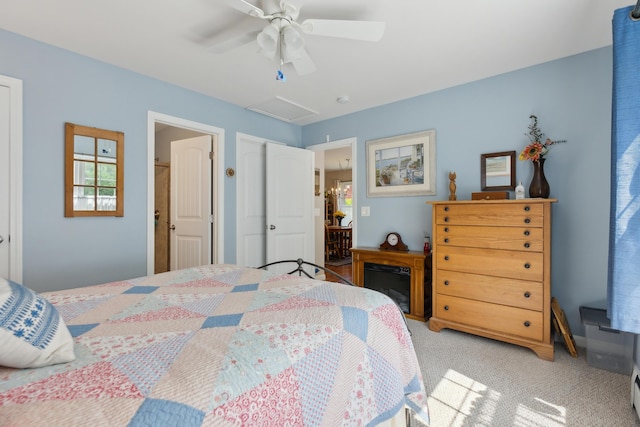 30 Agatha James Dr Unit 11, Kennebunk, ME 04043 - bedroom with light colored carpet, a closet, attic access, and a ceiling fan