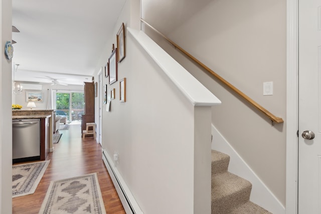 30 Agatha James Dr Unit 11, Kennebunk, ME 04043 - hallway featuring wood finished floors, stairs, baseboard heating, and baseboards