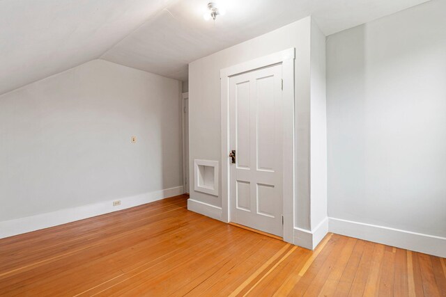 24 Emery Corner Rd, Limerick, ME 04048 - additional living space with light wood finished floors and vaulted ceiling