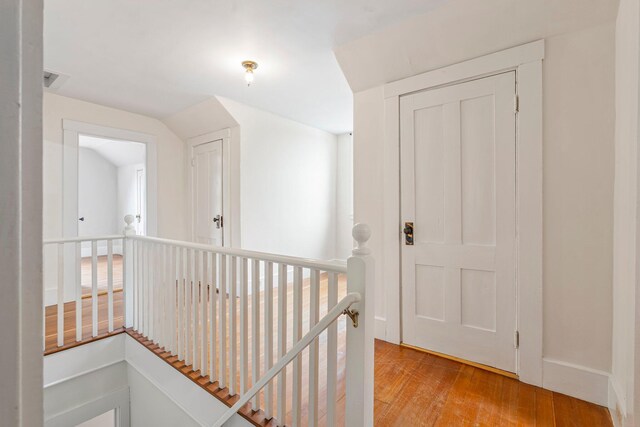 24 Emery Corner Rd, Limerick, ME 04048 - hallway featuring an upstairs landing and light wood-style floors