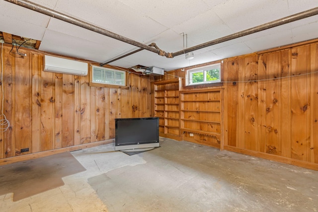 24 Emery Corner Rd, Limerick, ME 04048 - basement with a wall unit AC and wood walls