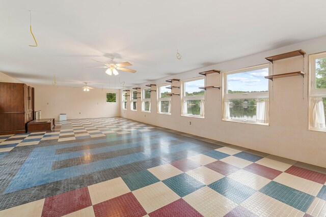 24 Emery Corner Rd, Limerick, ME 04048 - unfurnished room with ceiling fan and tile patterned floors