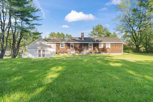20 Sunderland Dr, Auburn, ME 04210 - back of property featuring french doors, a yard, and a chimney