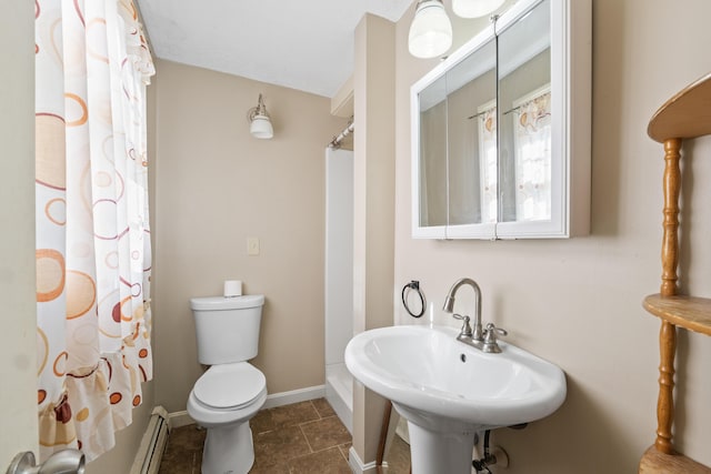 20 Sunderland Dr, Auburn, ME 04210 - bathroom featuring toilet, baseboards, a sink, a shower with curtain, and baseboard heating