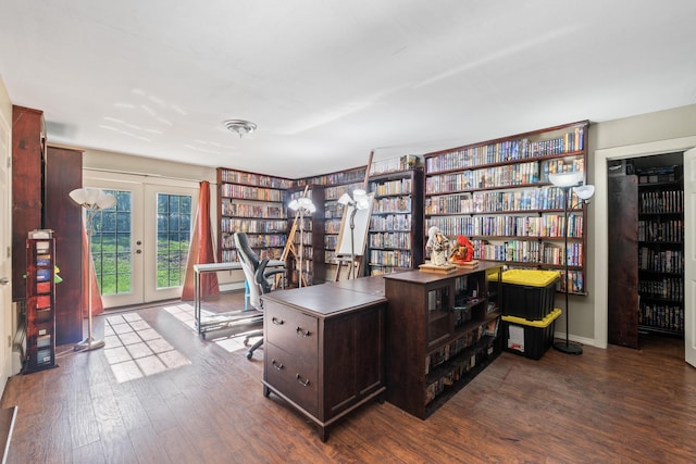 20 Sunderland Dr, Auburn, ME 04210 - home office featuring dark wood-type flooring, bookshelves, and french doors
