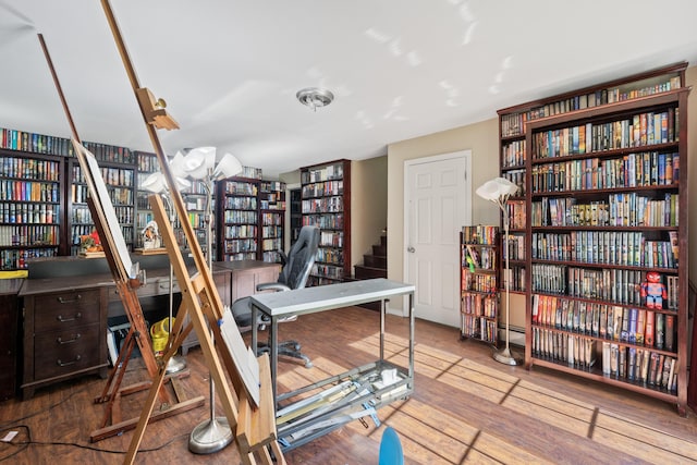 20 Sunderland Dr, Auburn, ME 04210 - home office with bookshelves and wood finished floors