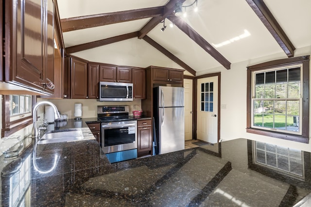 20 Sunderland Dr, Auburn, ME 04210 - kitchen with appliances with stainless steel finishes, a sink, dark brown cabinetry, and a peninsula