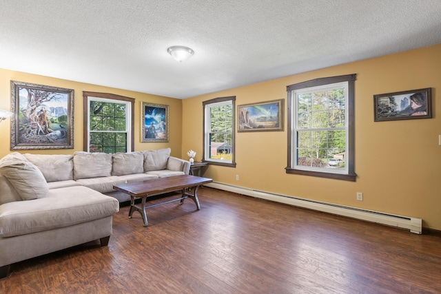 20 Sunderland Dr, Auburn, ME 04210 - living room featuring a baseboard radiator, dark wood-style floors, baseboards, and a textured ceiling