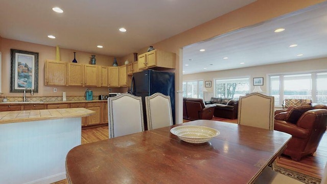72 Sand Beach Rd, Standish, ME 04084 - dining space featuring light wood-style floors and recessed lighting