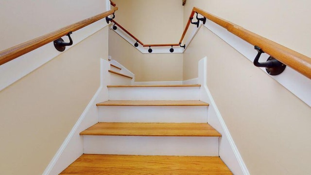 72 Sand Beach Rd, Standish, ME 04084 - staircase featuring wood finished floors