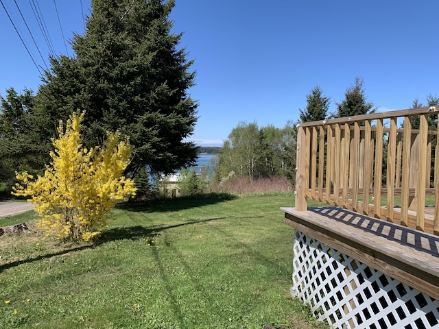 11 Brewster Rd, Eastport, ME 04631 - view of green lawn featuring a wooden deck