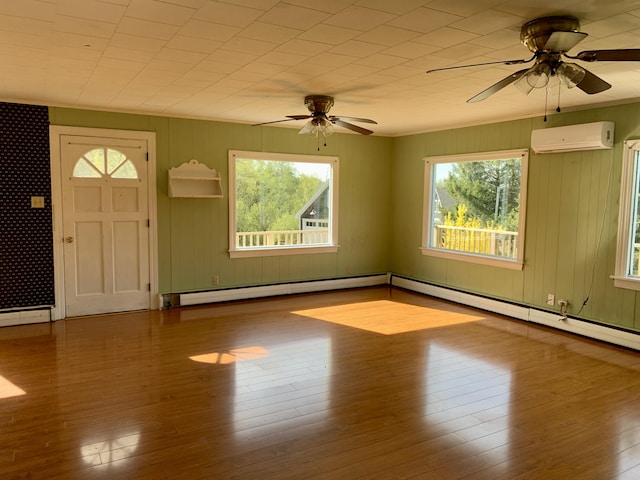 11 Brewster Rd, Eastport, ME 04631 - entrance foyer with a baseboard radiator, a ceiling fan, and healthy amount of natural light