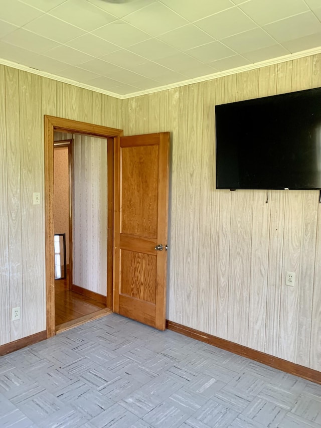 11 Brewster Rd, Eastport, ME 04631 - unfurnished room with baseboards and wooden walls