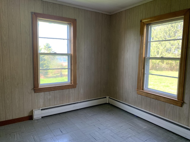 11 Brewster Rd, Eastport, ME 04631 - unfurnished room with healthy amount of natural light, baseboards, and ornamental molding