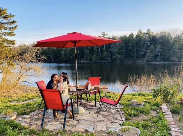 29 Fish Point Rd, Orland, ME 04472 - view of patio / terrace with a forest view and a water view