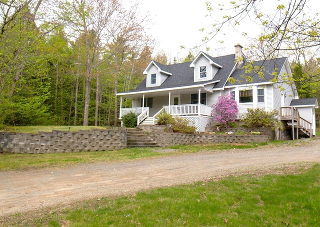 51 Brookview Dr, Bucksport, ME 04416 - cape cod home featuring covered porch, driveway, a chimney, and stairs