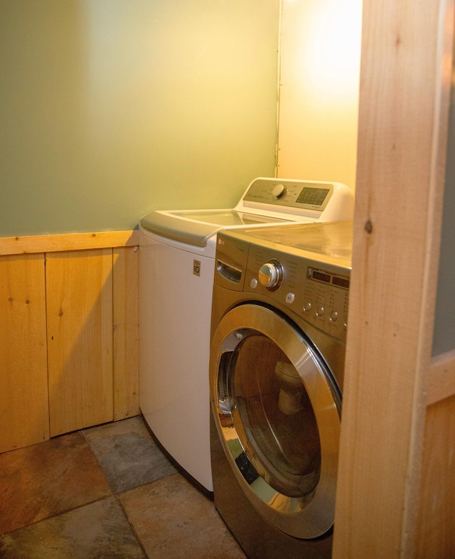 51 Brookview Dr, Bucksport, ME 04416 - laundry area with washing machine and dryer and light stone finish floors