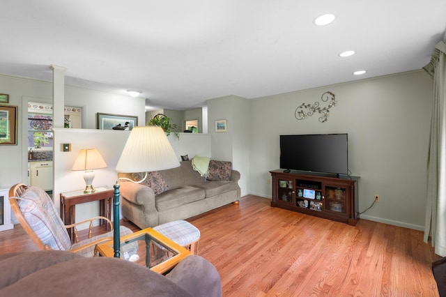 55 Woodland St, Fryeburg, ME 04037 - living area featuring wood finished floors, recessed lighting, and baseboards