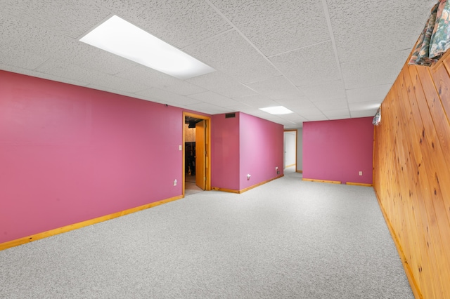 55 Woodland St, Fryeburg, ME 04037 - unfurnished room featuring wooden walls, baseboards, and carpet