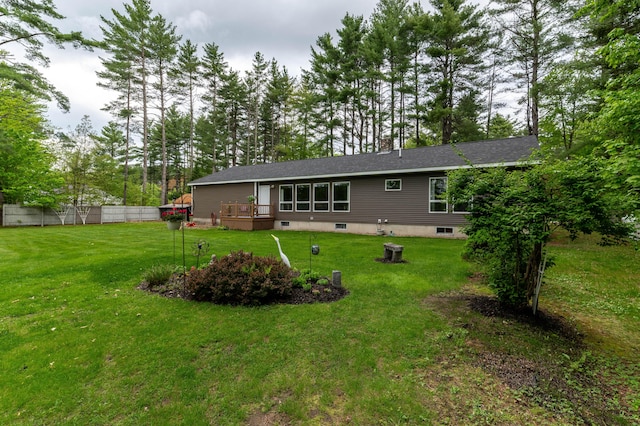 55 Woodland St, Fryeburg, ME 04037 - back of property with a wooden deck