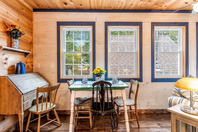 19 Birch Ests, Rome, ME 04963 - dining area featuring wood ceiling, wood finished floors, wooden walls, and baseboards
