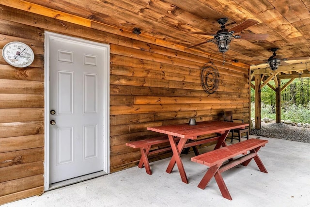 19 Birch Ests, Rome, ME 04963 - dining space with wood ceiling, a ceiling fan, and rustic walls