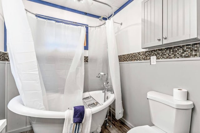 19 Birch Ests, Rome, ME 04963 - bathroom with wood finished floors, toilet, and shower / bathtub combination with curtain