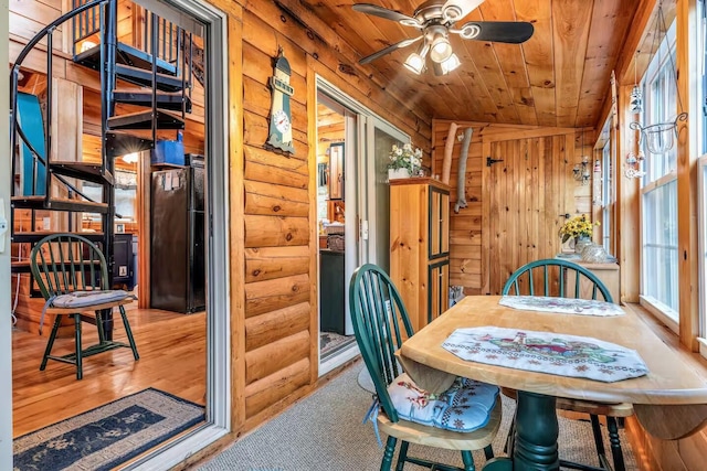19 Birch Ests, Rome, ME 04963 - dining area with log walls, wooden ceiling, a ceiling fan, and wood finished floors