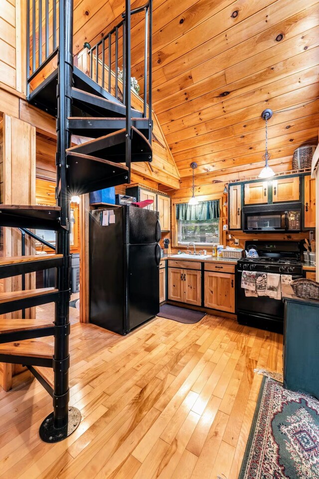 19 Birch Ests, Rome, ME 04963 - kitchen with black appliances, a sink, light wood-type flooring, hanging light fixtures, and wood ceiling