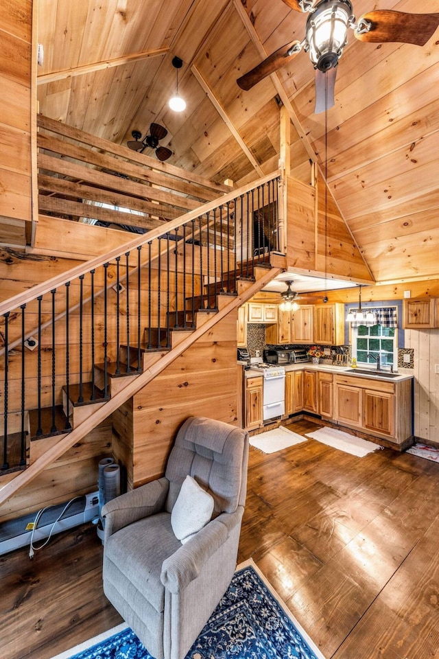 19 Birch Ests, Rome, ME 04963 - living room with wood ceiling, a ceiling fan, hardwood / wood-style floors, lofted ceiling, and wood walls