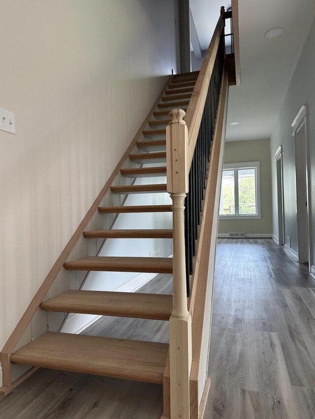 30 Elm St, Fort Kent, ME 04743 - stairway featuring wood finished floors