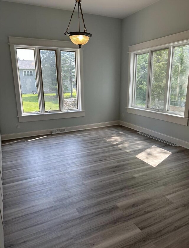 30 Elm St, Fort Kent, ME 04743 - empty room featuring baseboards and dark wood finished floors