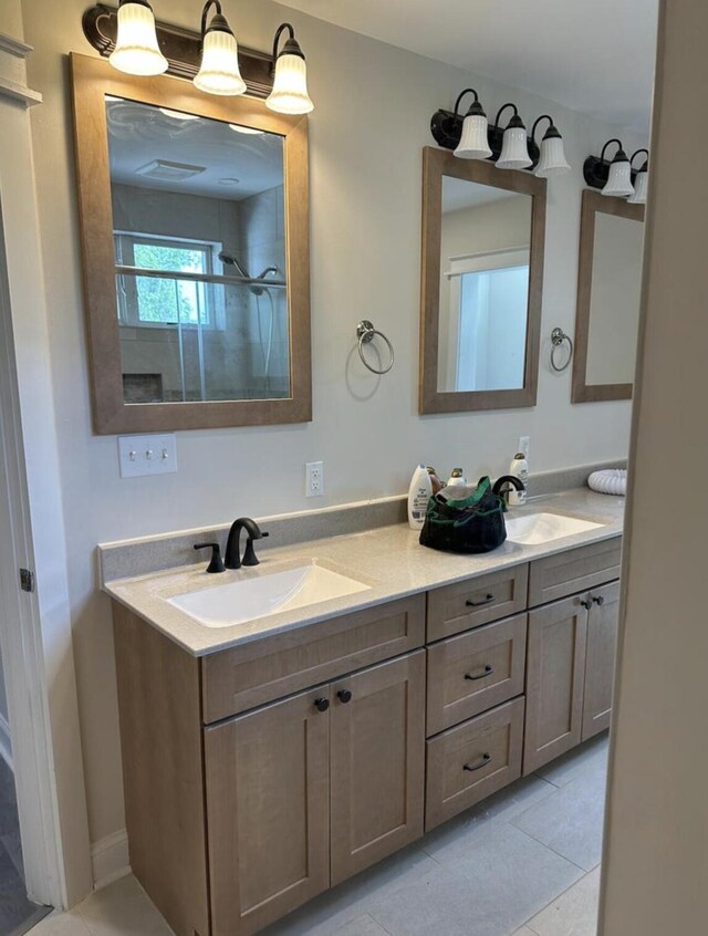 30 Elm St, Fort Kent, ME 04743 - bathroom featuring double vanity, tile patterned floors, and a shower