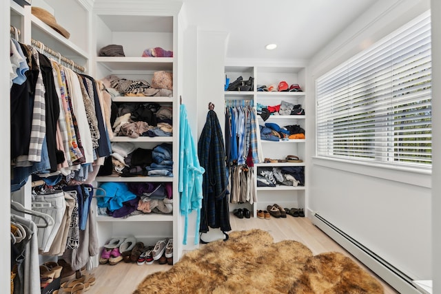 6 Roberts Ln, Kennebunkport, ME 04046 - walk in closet with a baseboard heating unit and wood finished floors