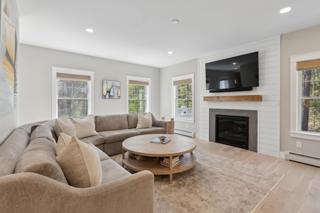 6 Roberts Ln, Kennebunkport, ME 04046 - living area featuring a baseboard radiator, wood finished floors, plenty of natural light, and recessed lighting