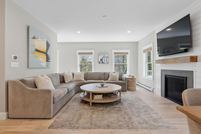 6 Roberts Ln, Kennebunkport, ME 04046 - living room featuring baseboard heating, light wood-style floors, recessed lighting, and a large fireplace