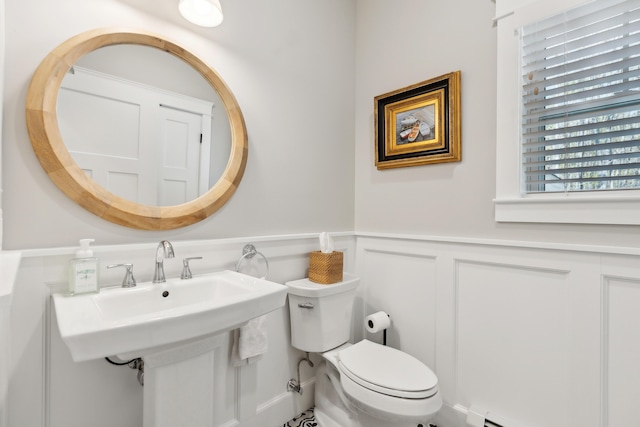 6 Roberts Ln, Kennebunkport, ME 04046 - bathroom featuring wainscoting, a decorative wall, and toilet