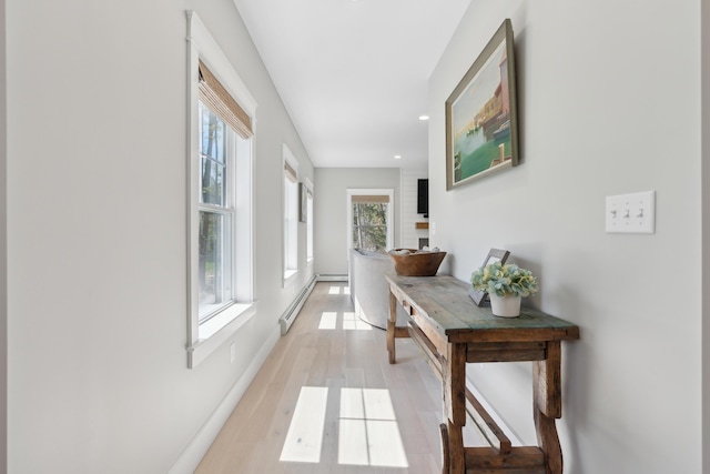 6 Roberts Ln, Kennebunkport, ME 04046 - corridor with light wood-style flooring, a baseboard radiator, recessed lighting, baseboards, and a baseboard heating unit