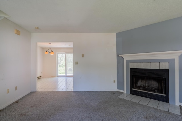 48 Pine Hill Dr Unit 48, Bath, ME 04530 - unfurnished living room featuring carpet, tile patterned floors, a baseboard radiator, and a tiled fireplace
