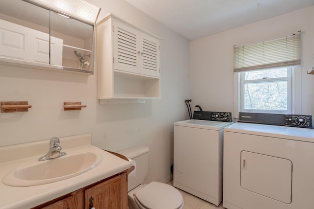 48 Pine Hill Dr Unit 48, Bath, ME 04530 - bathroom with washing machine and clothes dryer, toilet, and vanity